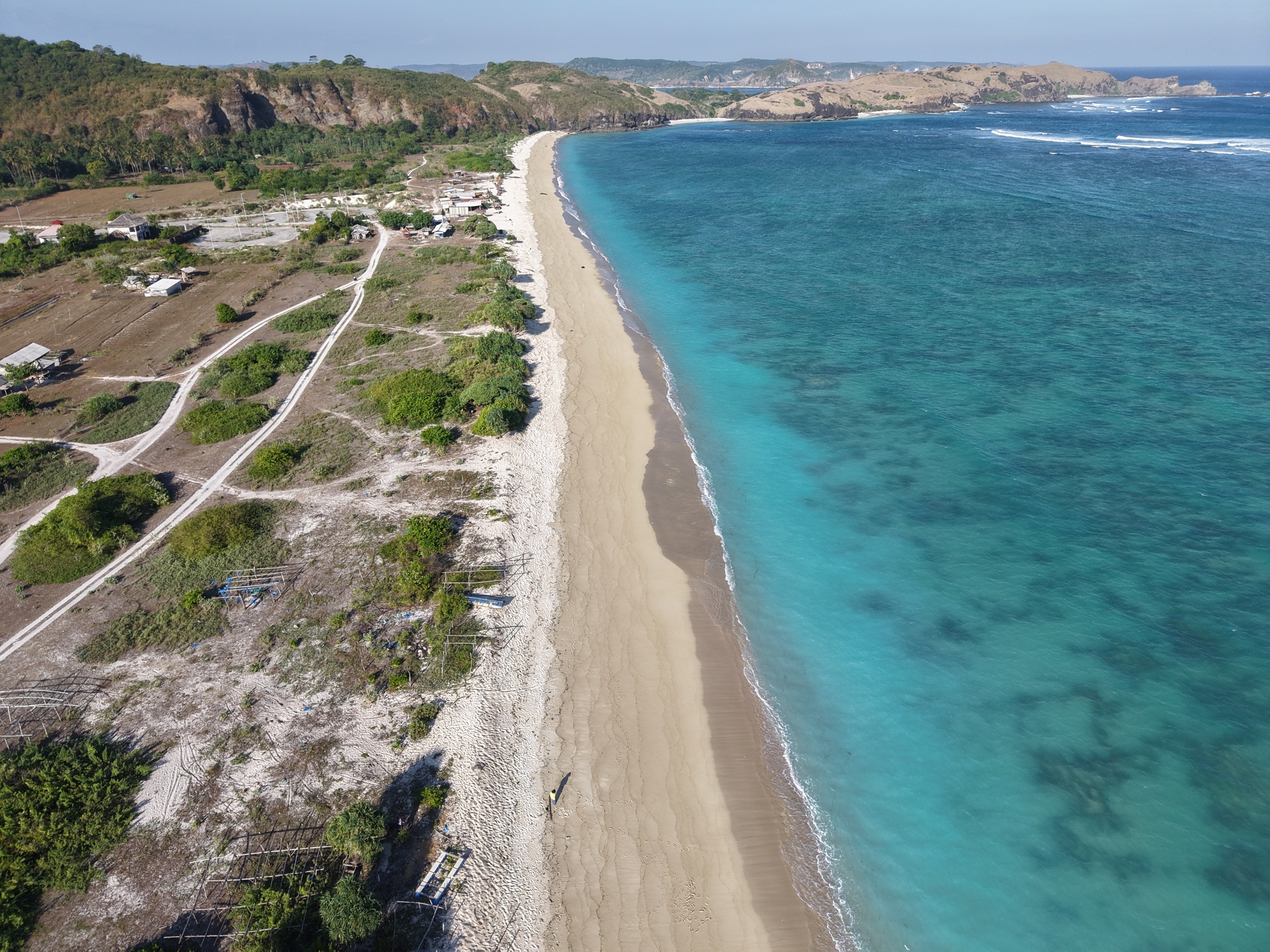 Aerial view of a coastal development corridor in Lombok