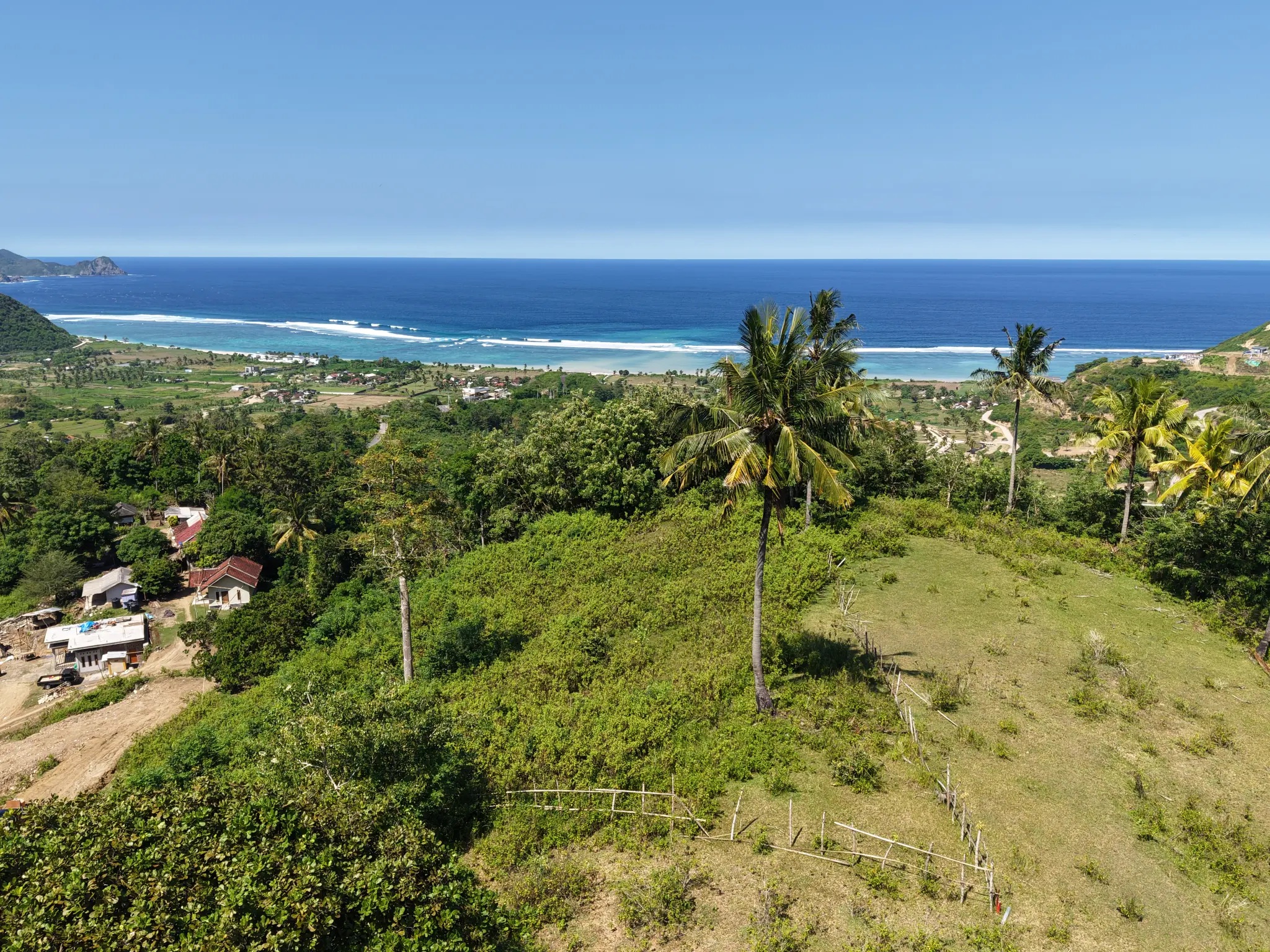 Aerial view of land and coastline in Lombok